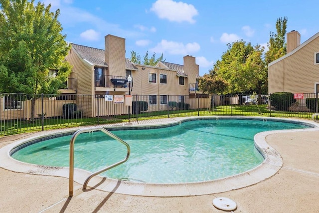community pool with fence