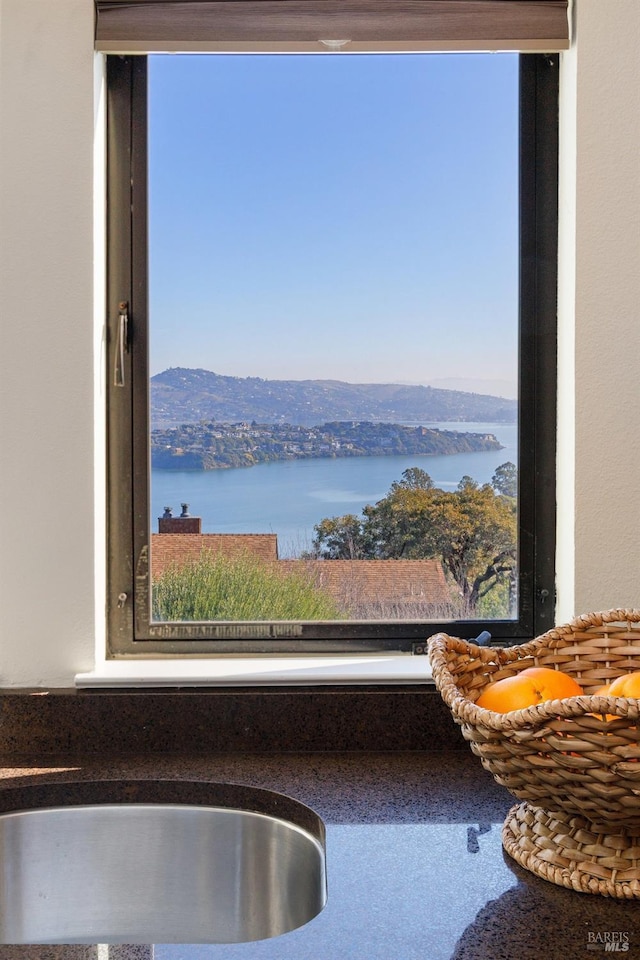 property view of water featuring a mountain view