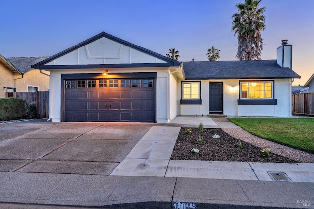 ranch-style home with a garage