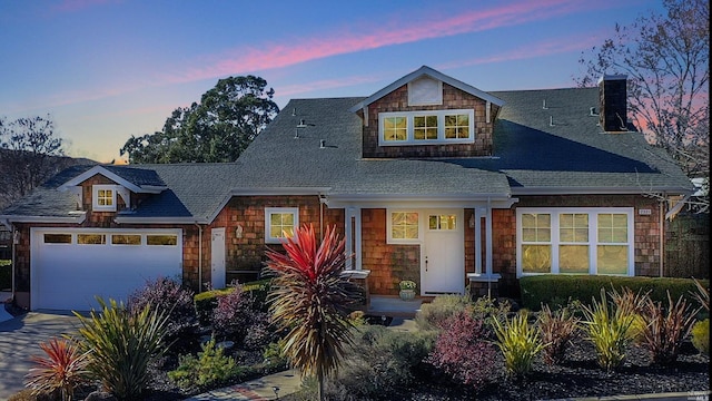 view of front of home with a garage