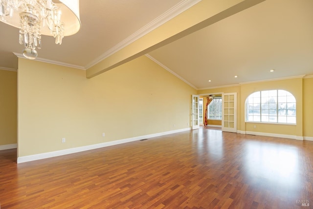 unfurnished living room with ornamental molding, lofted ceiling, hardwood / wood-style floors, and a notable chandelier