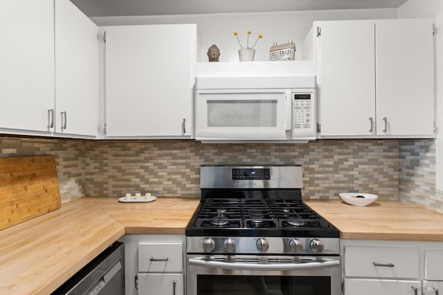 kitchen with white cabinetry, gas stove, black dishwasher, and decorative backsplash