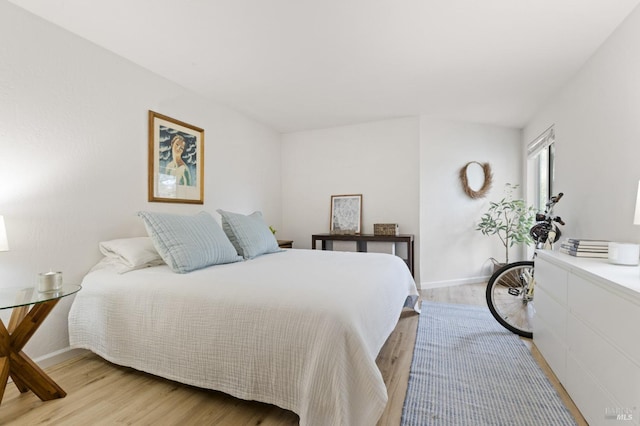 bedroom with light hardwood / wood-style floors