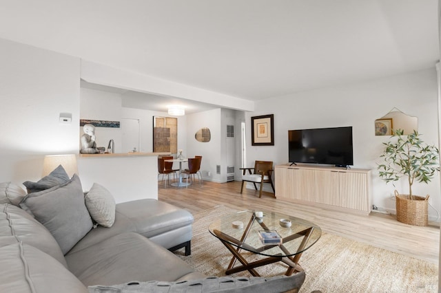 living room featuring light wood-type flooring