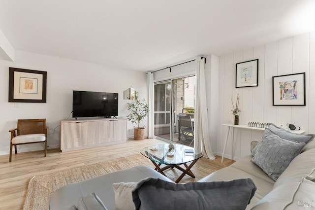 living room with light hardwood / wood-style flooring