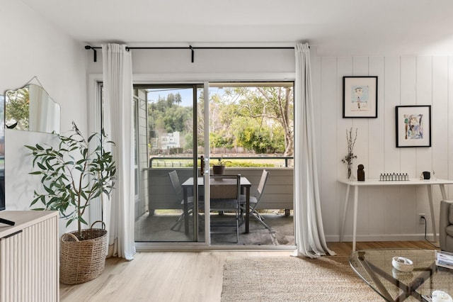 doorway to outside with hardwood / wood-style floors