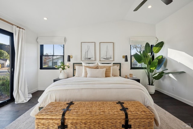 bedroom featuring vaulted ceiling, dark hardwood / wood-style floors, and ceiling fan