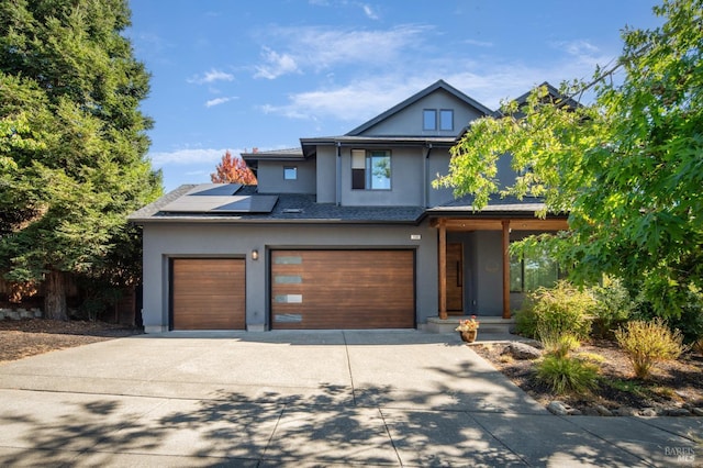 view of front of house with solar panels