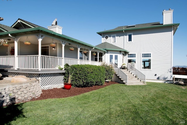 1656 Middle Two Rock Rd, Petaluma, CA 94952 - back of property featuring a chimney, a yard, and covered porch