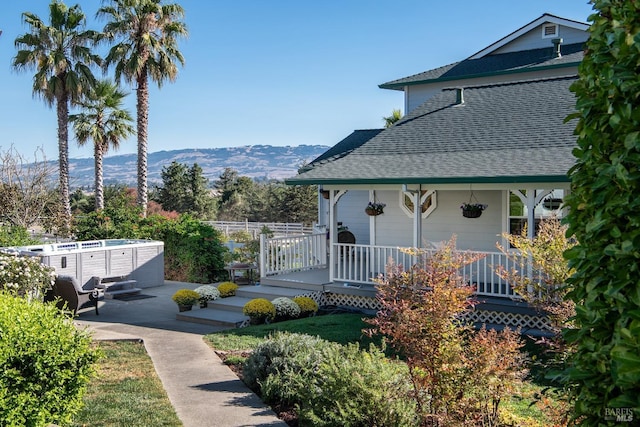 1656 Middle Two Rock Rd, Petaluma, CA 94952 - view of property exterior with roof with shingles, a mountain view, and a patio
