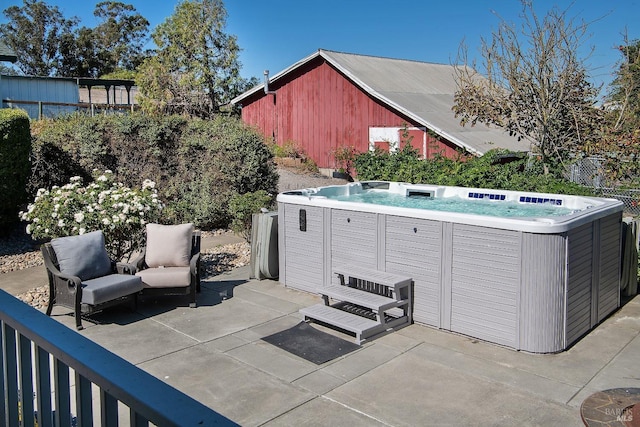 view of patio with a hot tub