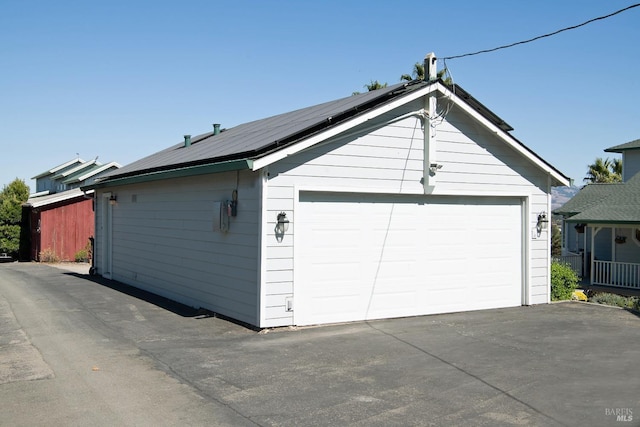 garage featuring solar panels