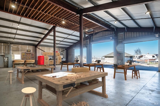 dining space featuring concrete flooring