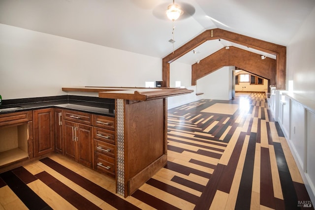 bar with lofted ceiling