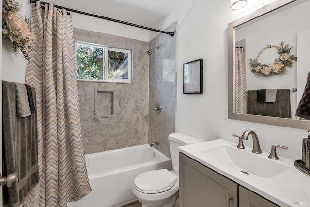 full bathroom featuring shower / tub combo with curtain, vanity, and toilet