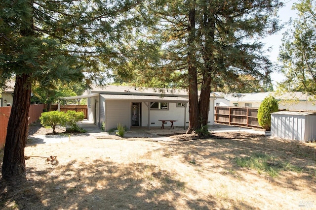 rear view of house with a patio area