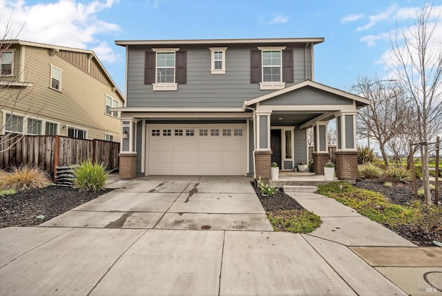 view of front of property with a garage and a porch