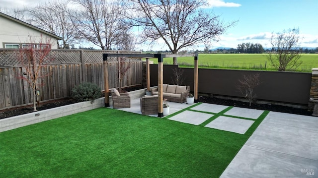 view of yard featuring outdoor lounge area and a patio