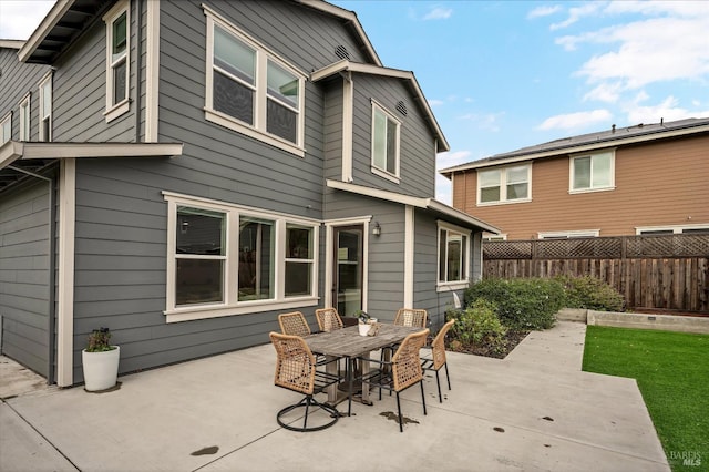 rear view of house with a patio area