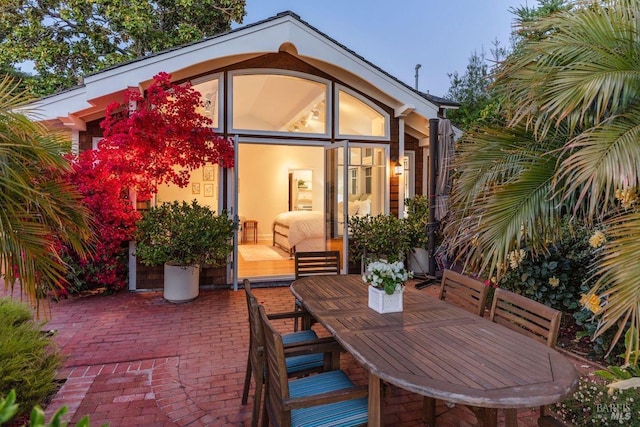 back of house featuring a patio