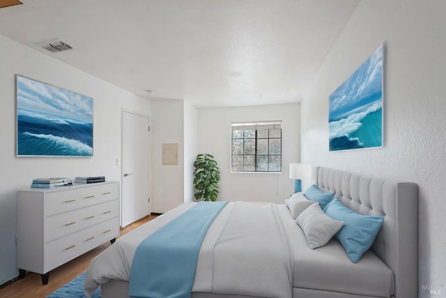 bedroom featuring hardwood / wood-style flooring