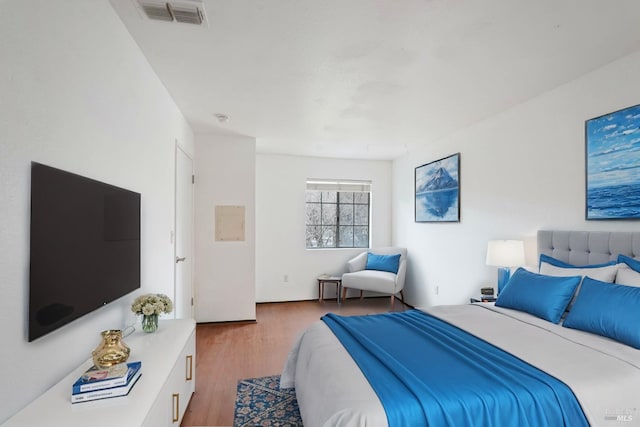 bedroom featuring hardwood / wood-style floors