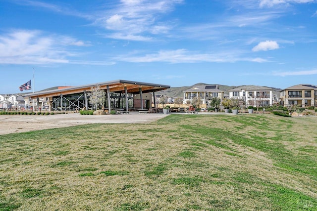 view of home's community featuring a yard