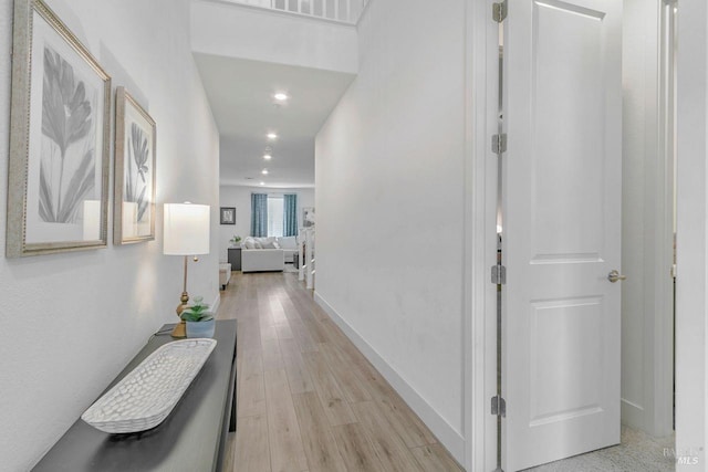 hallway with light wood-type flooring