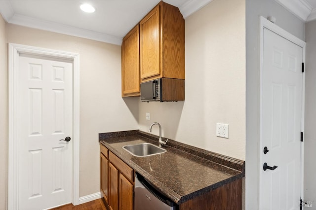 kitchen with sink, crown molding, and dishwasher