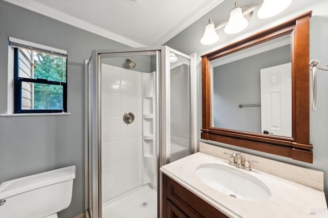 bathroom with ornamental molding, toilet, an enclosed shower, and vanity