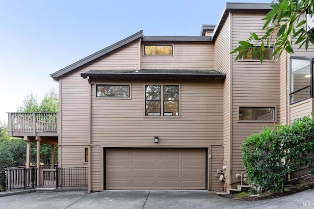 view of side of home with a garage