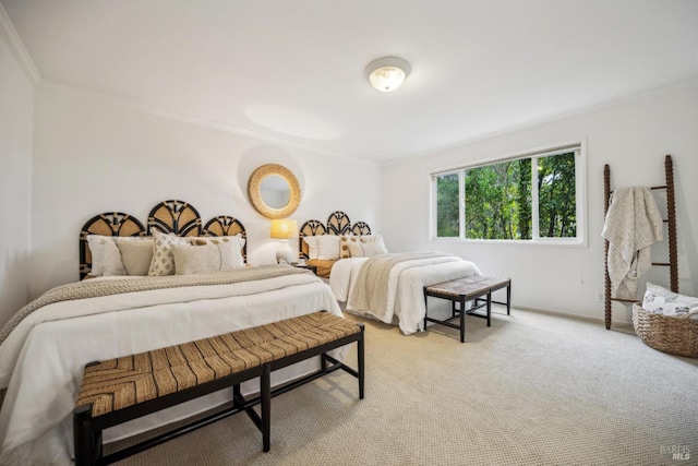 bedroom featuring light carpet and ornamental molding