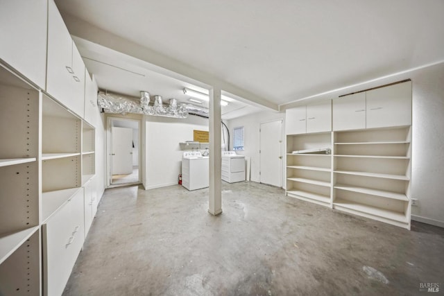 basement with separate washer and dryer