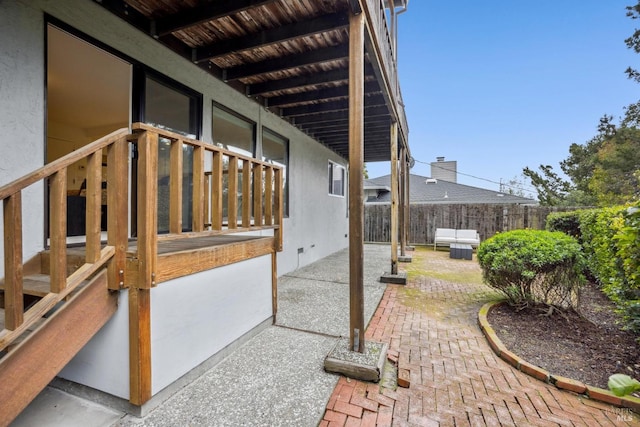 exterior space with an outdoor living space and a patio area