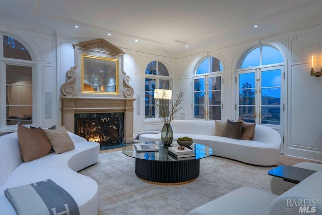 sunroom / solarium with a fireplace