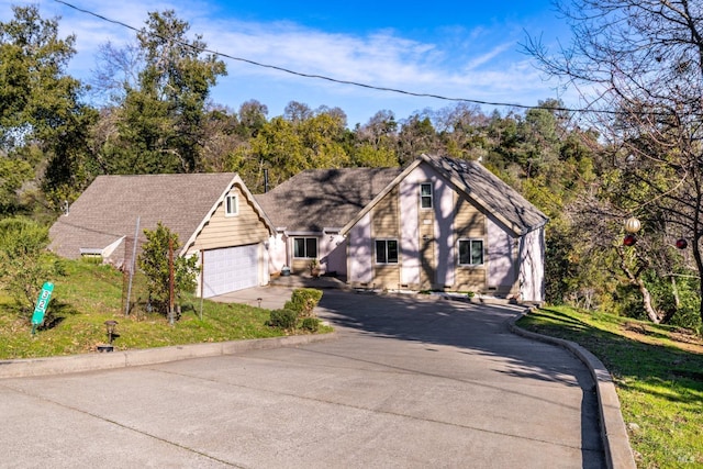 view of front of property with a garage