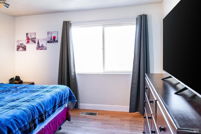 bedroom featuring light hardwood / wood-style floors