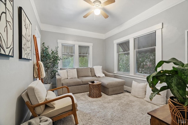 interior space featuring crown molding, plenty of natural light, and ceiling fan