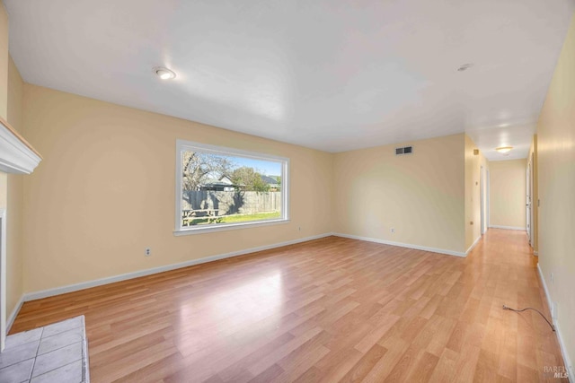 unfurnished living room with light hardwood / wood-style floors