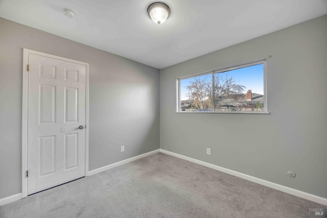 view of carpeted spare room