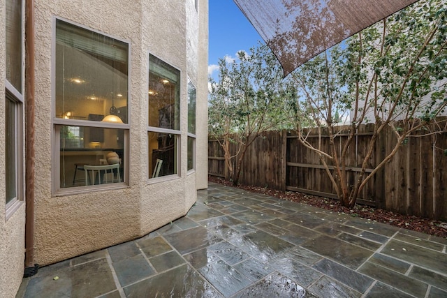 view of patio / terrace with fence