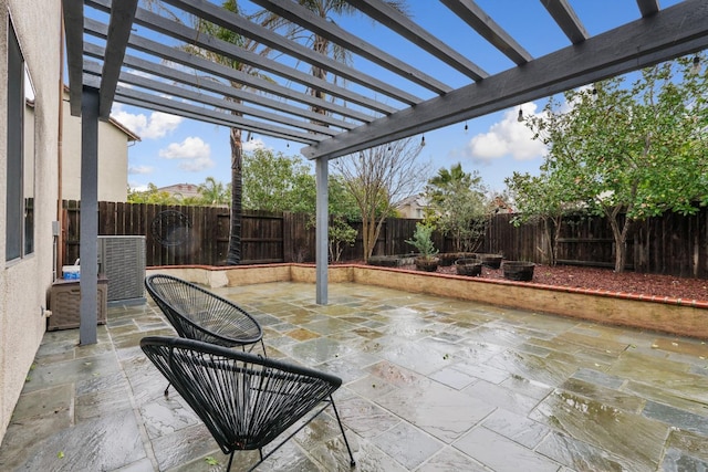 view of patio / terrace featuring a fenced backyard and a pergola