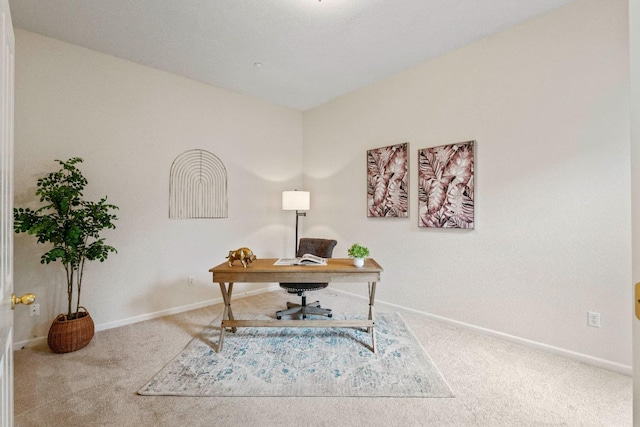 office area with baseboards and carpet flooring