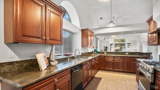 kitchen with dishwashing machine, light tile patterned flooring, a sink, stainless steel gas range, and dark stone countertops