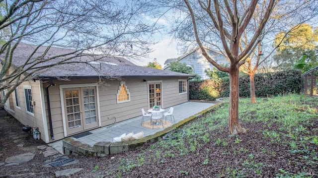 back of property with a patio area