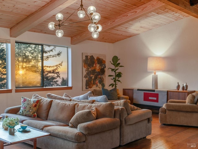 living area featuring beam ceiling, wood ceiling, and wood finished floors