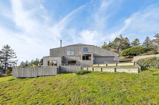 view of yard featuring a vegetable garden, an outdoor structure, and fence