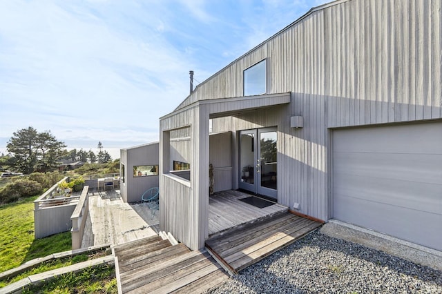 wooden deck featuring french doors