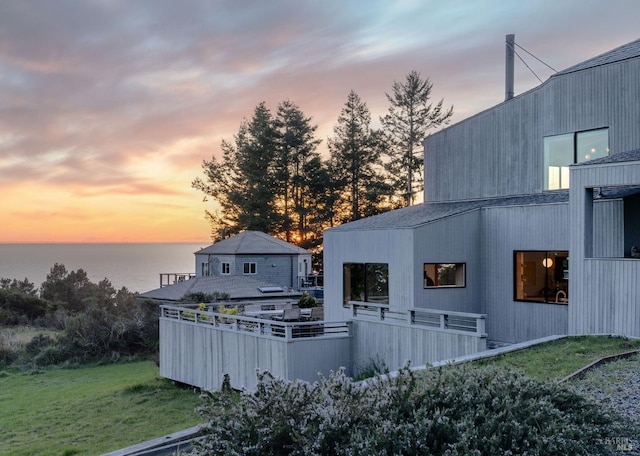 rear view of house with a water view