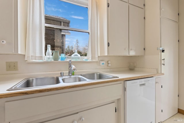 825 N Forbes St, Lakeport, CA 95453 - kitchen with dishwasher, sink, and white cabinets